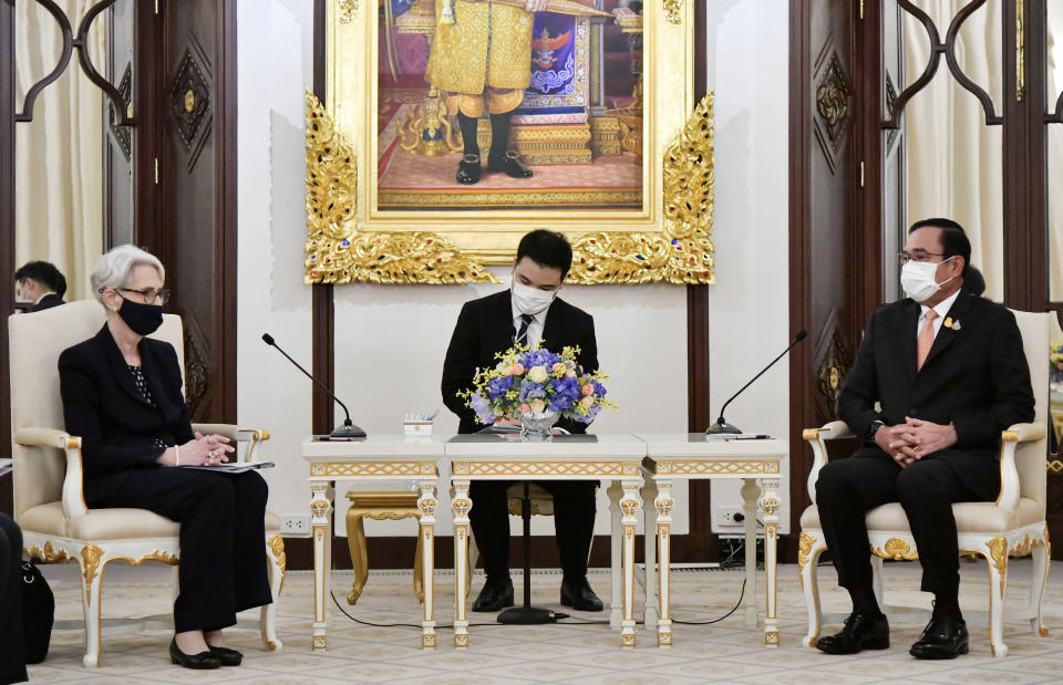 In this photo released by Government Spokesman Office, U.S. Deputy Secretary of State Wendy R. Sherman, left, meets Thailand's Prime Minister Prayuth Chan-ocha, right, at Government House in Bangkok, Thailand, Wednesday, June 2, 2021. (Government Spokesman Office via AP)