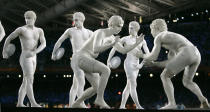 <p>Performers at the Opening Ceremony in 2004 dressed as statues of athletes to celebrate Athens as the location of the first modern Olympics. (AP) </p>