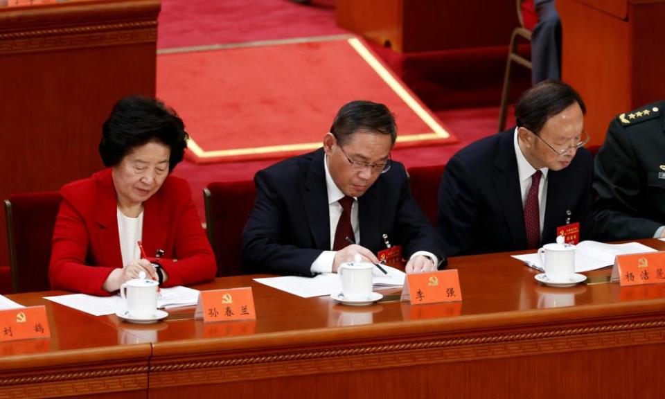 Chinese Vice Premier Sun Chunlan, Shanghai Communist party Secretary Li Qiang and Yang Jiechi, director of the Office of the Central Commission for Foreign Affairs, attend the opening ceremony of the 20th National Congress of the Communist party of China