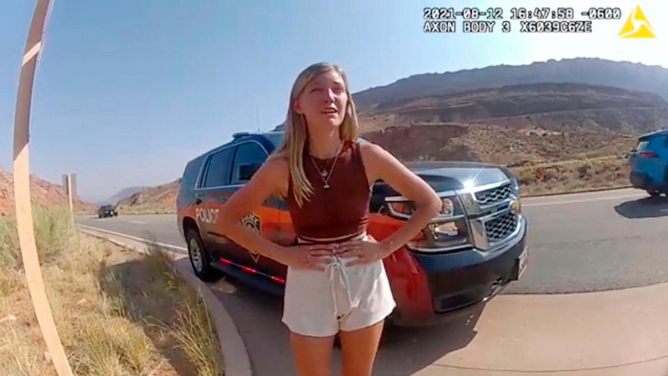 PHOTO: In this image taken from police body camera video provided by the Moab Police Department, Gabby Petito talks to a police officer near the entrance to Arches National Park on Aug. 12, 2021. (Moab Police Department via AP, FILE)