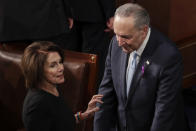 <p>Pelosi of California talks with Schumer of New York before the State of the Union address on Capitol Hill in Washington, D.C., on Jan. 30. (Photo: J. Scott Applewhite/AP) </p>