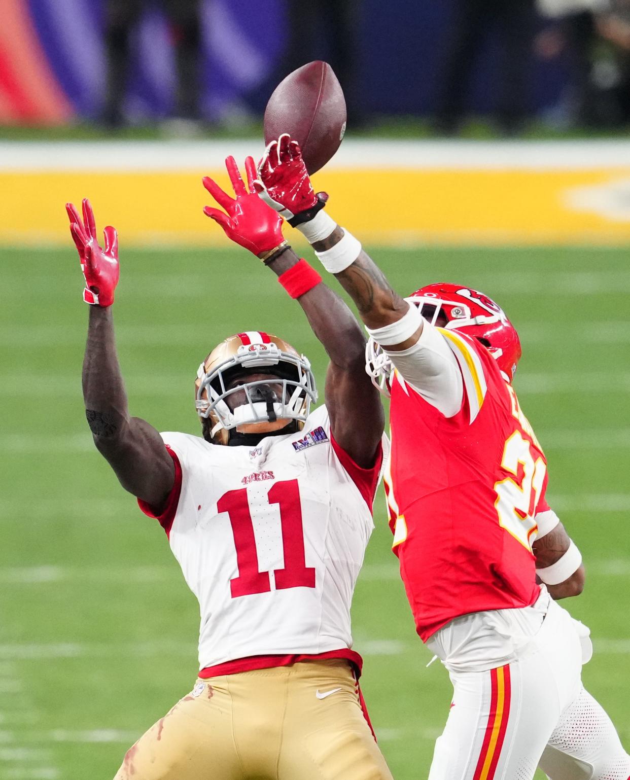 Kansas City Chiefs safety Mike Edwards breaks up a pass intended for San Francisco 49ers wide receiver Brandon Aiyuk