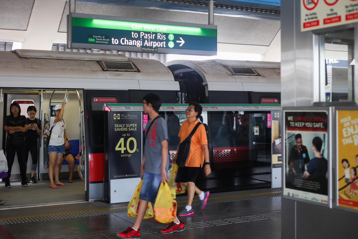 Commuters on an East West Line train platform. (Yahoo News Singapore file photo)