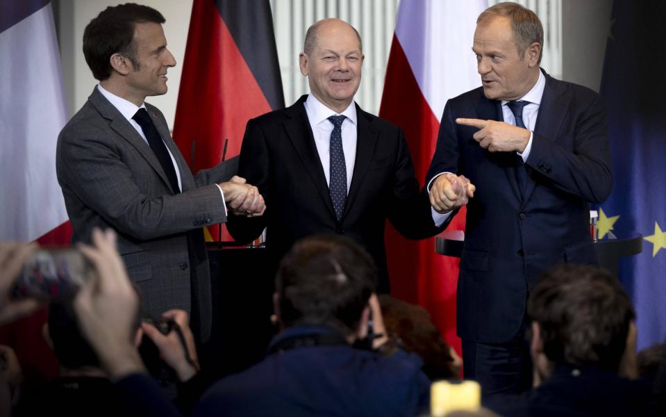 Emmanuel Macron, Olaf Scholz and Donald Tusk at the Chancellery Office in Berlin