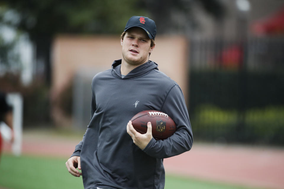 USC quarterback Sam Darnold made a surprise appearance at a makeup pro day for two of his college teammates. (AP)