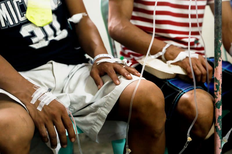 Patients poisoned after drinking coconut wine are treated at an emergency ward in Philippine General Hospital in Manila