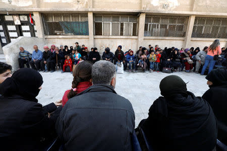 Civilians evacuated from the town of Douma, Eastern Ghouta arrive at Wafideen camp in Damascus, Syria March 13, 2018. REUTERS/Omar Sanadiki