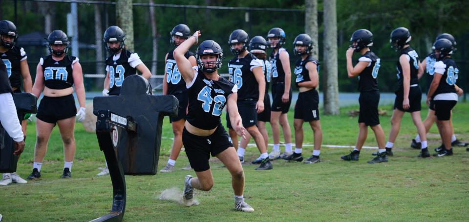 Ponte Vedra High School varsity football players practice at the school on Tuesday, Aug. 2, 2022. 