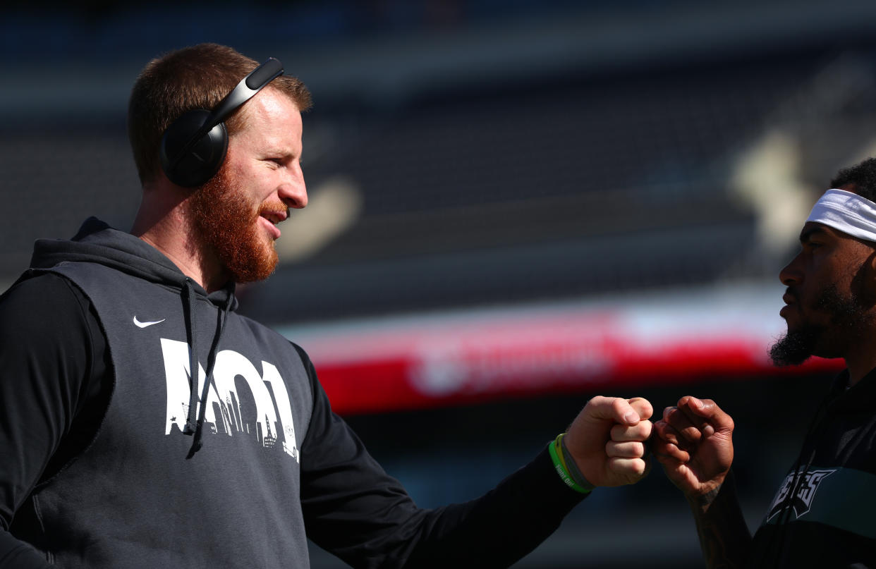 PHILADELPHIA, PA - NOVEMBER 03: Philadelphia Eagles Quarterback Carson Wentz (11) bumps fists with Philadelphia Eagles Wide Receiver DeSean Jackson (10) before the game between the Chicago Bears and Philadelphia Eagles on November 03, 2019 at Lincoln Financial Field in Philadelphia, PA. (Photo by Kyle Ross/Icon Sportswire via Getty Images)