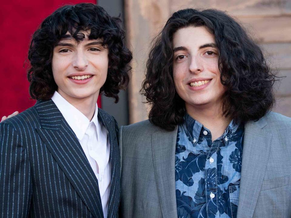 <p>Emma McIntyre/FilmMagic</p> Finn Wolfhard and Nick Wolfhard attend the premiere of "It Chapter Two" on August 26, 2019 in Westwood, California. 