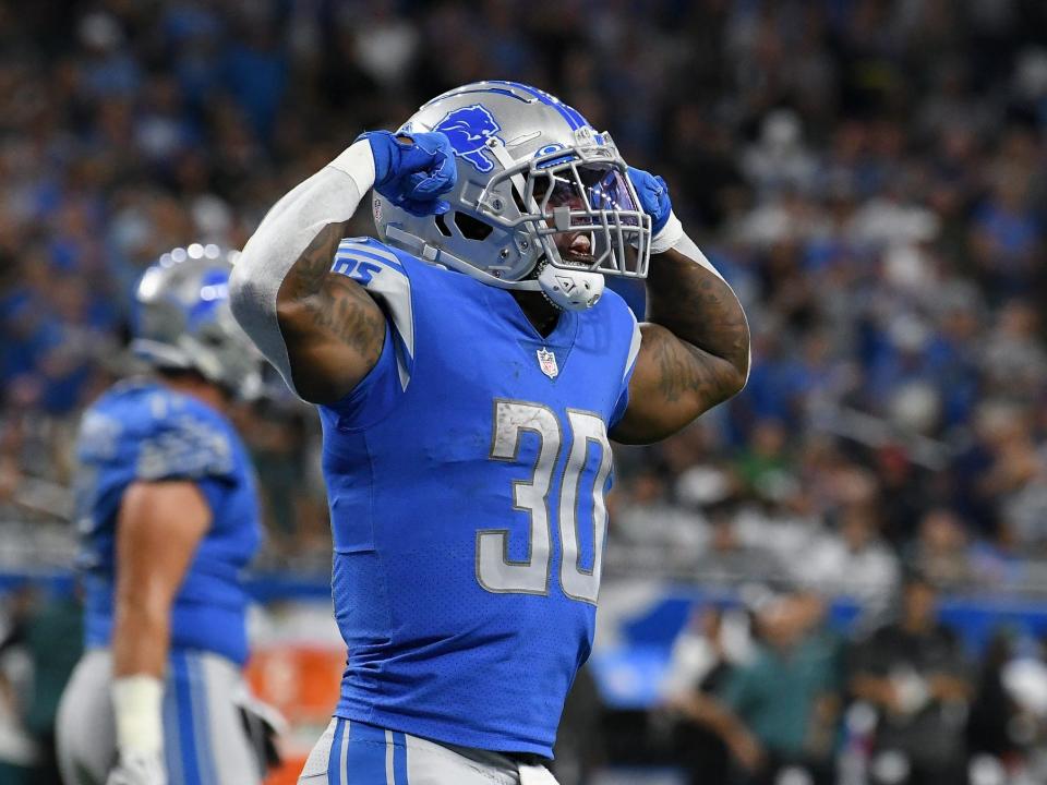 Jamaal Williams celebrates a touchdown against the Philadelphia Eagles.