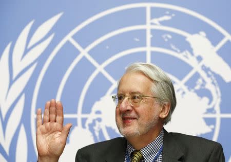 Paulo Pinheiro, chairperson of the International Commission of Inquiry on Syria, greets a member of the media before a news conference at the United Nations in Geneva November 14, 2104. REUTERS/Denis Balibouse