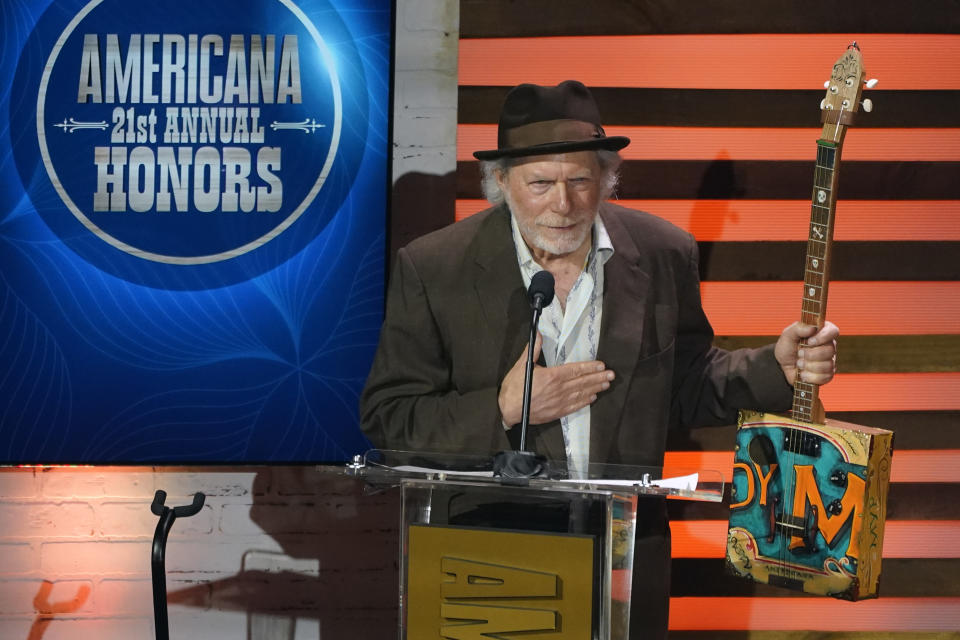 Buddy Miller accepts the Lifetime Achievement Award at the Americana Honors & Awards show Wednesday, Sept. 14, 2022, in Nashville, Tenn. (AP Photo/Mark Humphrey)