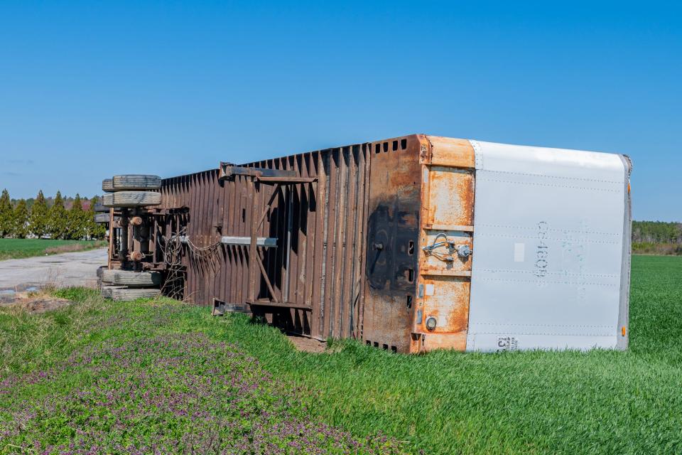 The trailer lies on the side a day after a tornado passed through the Greenwood area on April 1, 2023.