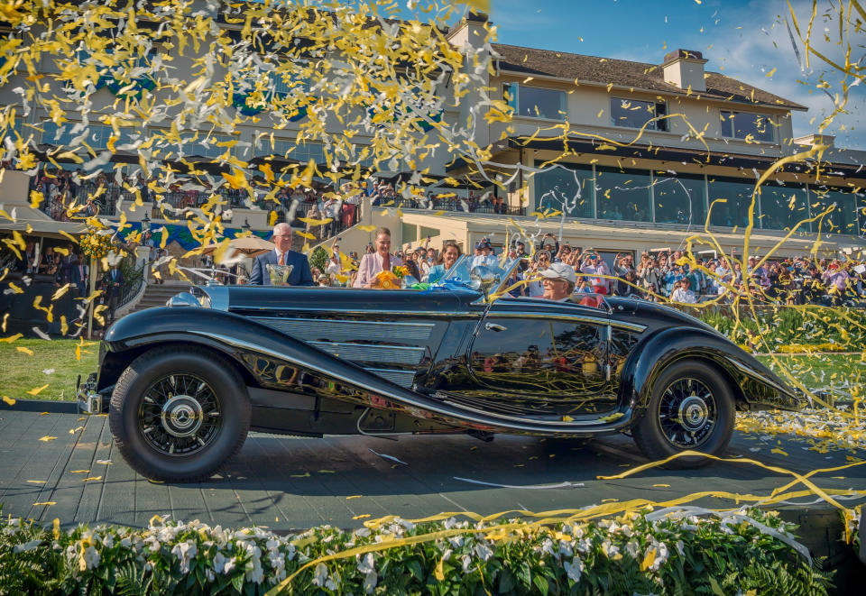 The confetti flies over Jim Patterson's 1937 Mercedes-Benz 540K Special Roadster as it is named Best of Show at the 2023 Pebble Beach Concours d'Elegance. The Concours, founded in 1950, raised $2.68 million for charity this year, bringing total donations over the years to $37 million. (Photo credit: Kimball Studios / Pebble Beach Concours d'Elegance)
