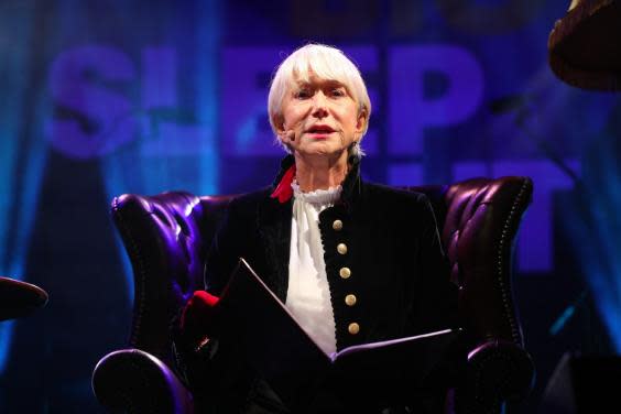 PA: Helen Mirren reads a bedtime story at the World's Big Sleep Out at Trafalgar Square in London. (PA)