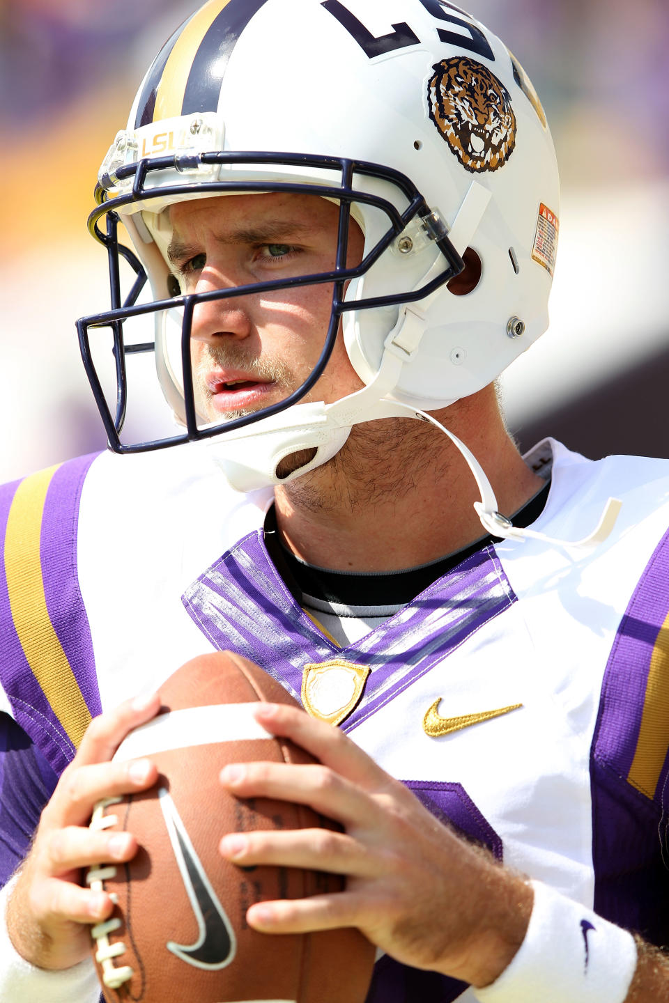 BATON ROUGE, LA - OCTOBER 22: Quarterback Jarrett Lee #12 of the LSU Tigers warms up prior to the game against the Auburn Tigers at Tiger Stadium on October 22, 2011 in Baton Rouge, Louisiana. (Photo by Jamie Squire/Getty Images)