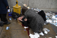 <p>MAR. 22, 2017 – A woman lies injured after a shooting incident on Westminster Bridge in London. (Photo: Toby Melville/Reuters) </p>