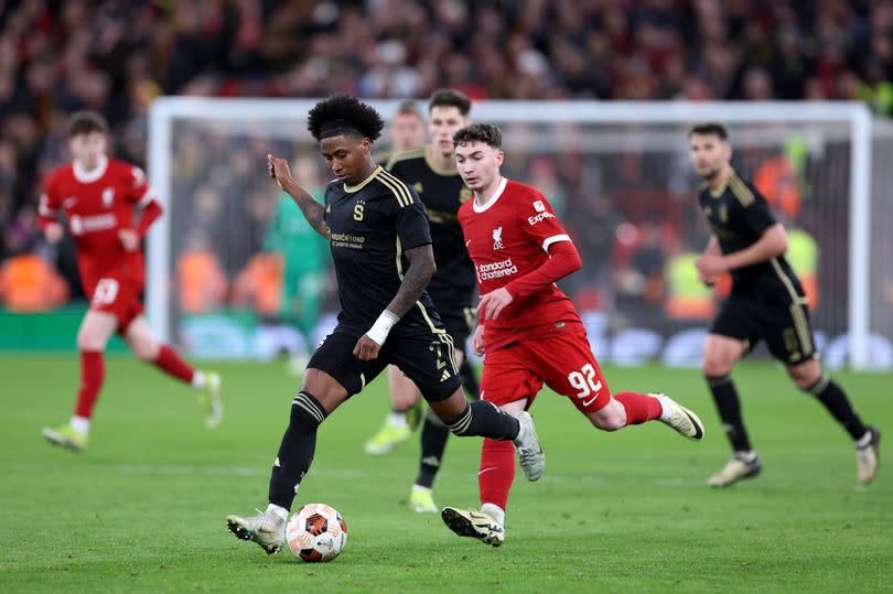 Angelo Preciado of Sparta Prague controls the ball whilst under pressure from Mateusz Musialowski of Liverpool during the UEFA Europa League 2023/24 round of 16 second leg match between Liverpool FC and AC Sparta Praha at Anfield on March 14, 2024 in Liverpool, England.