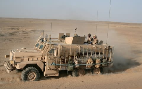 A Mastiff armoured vehicle on patrol in Afghanistan. A new paper says the British Army needs to update its fleet of vehicles. Photo dated July 2016.  - Credit: Marco Di Lauro/Getty Images