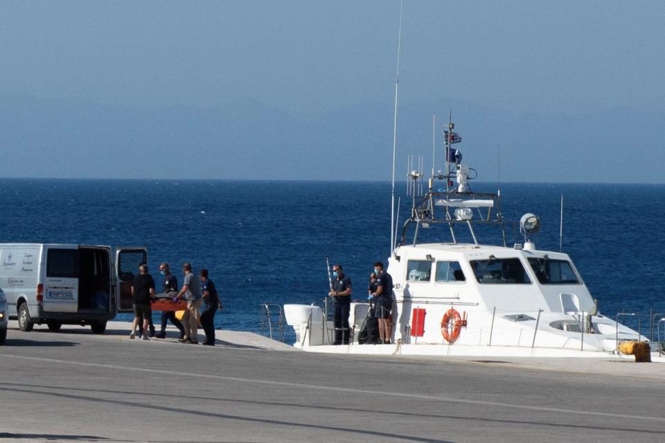 Hellenic Coast Guard officers transfer the body of British TV doctor Michael Mosley, who was found dead after going missing on the island of Symi, at a port on the island of Rhodes, Greece, on June 9, 2024.