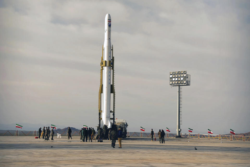 In this photo released Wednesday, April 22, 2020, by Sepahnews, an Iranian rocket carrying a satellite is prepared for launch from an undisclosed site believed to be in Iran's Semnan province. Iran's Revolutionary Guard said Wednesday it put the Islamic Republic's first military satellite into orbit, dramatically unveiling what experts described as a secret space program with a surprise launch that came amid wider tensions with the United States. (Sepahnews via AP)