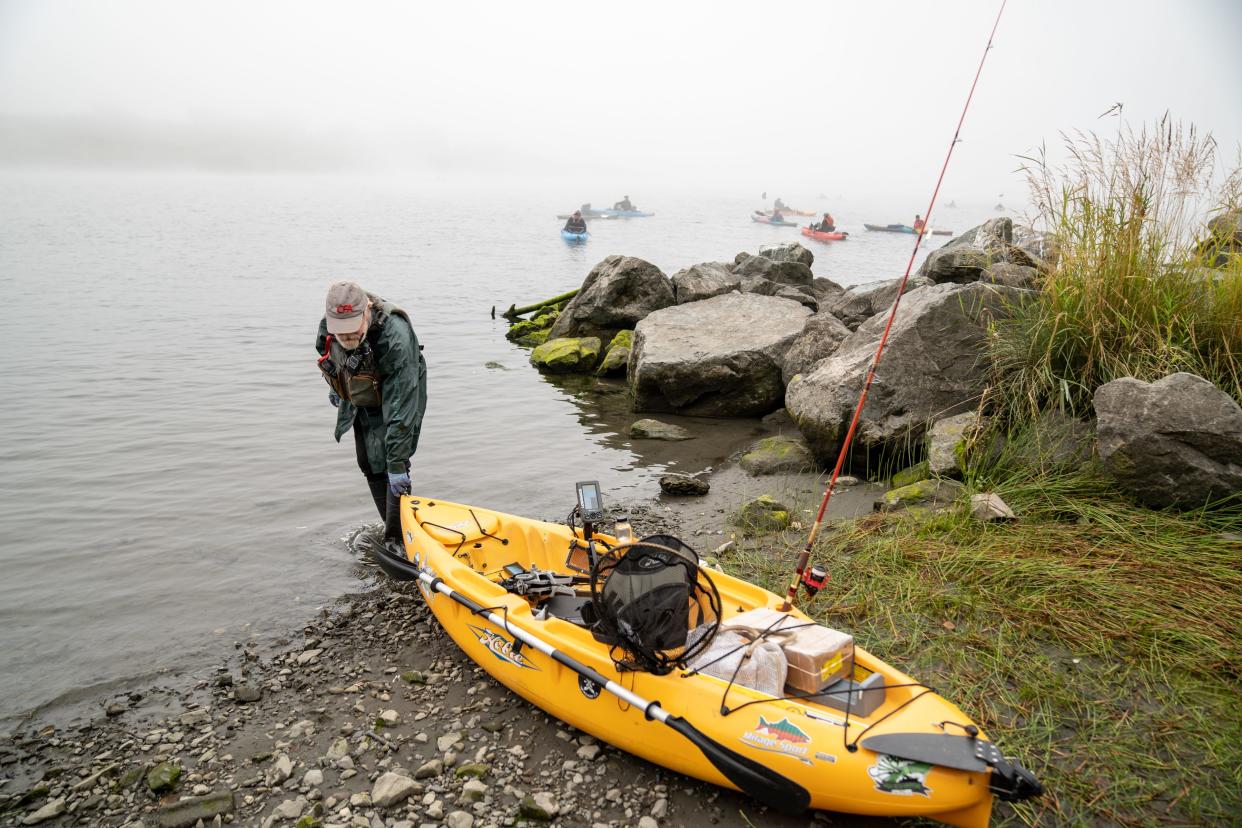 David Bradfield, a retired professor from California State University, Dominguez Hills, prepares to ride with a group of recreational kayakers along the Klamath River in Requa, Calif., on Aug. 20, 2023.