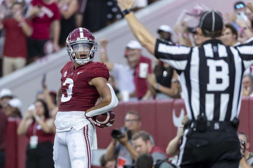 Alabama wide receiver Jermaine Burton (3) reacts after scoring the first touchdown of the season during the first half of an NCAA college football game against Utah State, Saturday, Sept. 3, 2022, in Tuscaloosa, Ala. (AP Photo/Vasha Hunt)