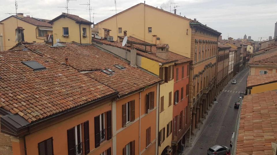 Bologna is famed for its red rooftops (ES)