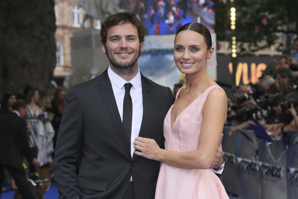 Sam Claflin and Laura Haddock pose for photographers upon arrival at the premiere of the film 'Transformers The Last Knight' in London, Sunday, June 18, 2017. (Photo by Joel Ryan/Invision/AP)