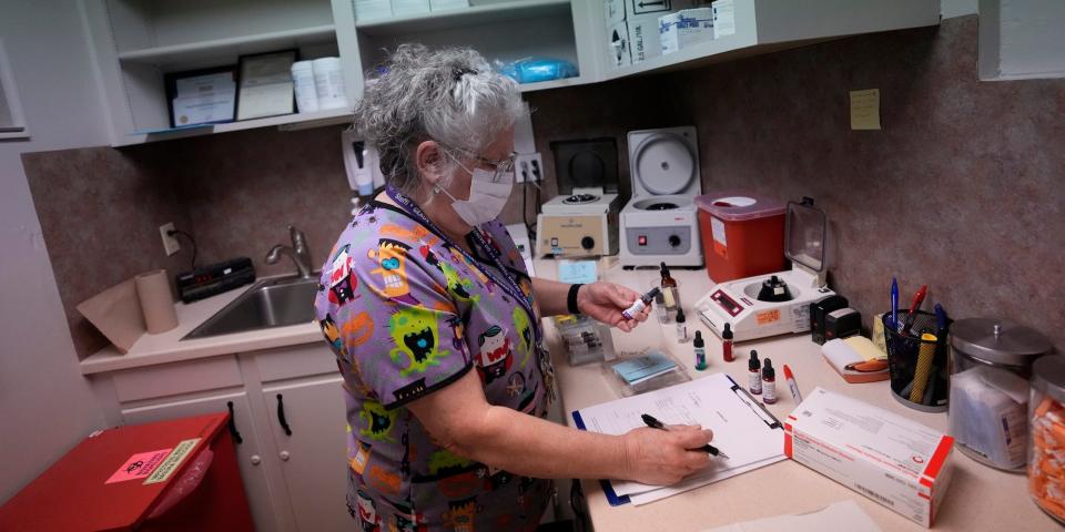 Lab technician Stephannie Chaffee prepares materials that will be used to test women's blood ahead of the arrival of patients, Saturday, Oct. 9, 2021, at Hope Medical Group for Women in Shreveport, La.