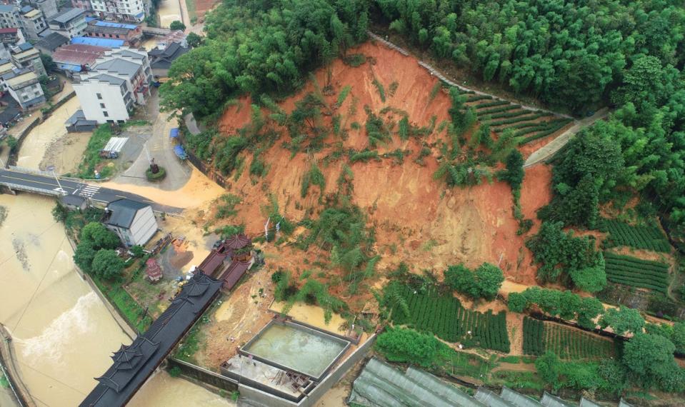 Aerial drone image shows landslide in an area affected by torrential rains in Tieshan Township of Zhenghe County (AP)