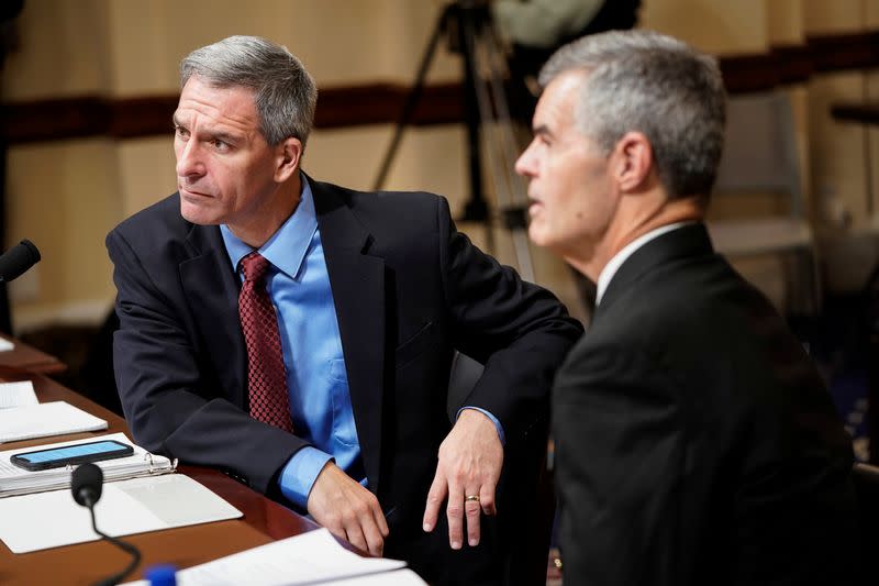 Ken Cuccinelli and Stephen C. Redd of the CDC wait to testify to a House Homeland Security Committee hearing on "Confronting the Coronavirus: The Federal Response" on Capitol Hill in Washington