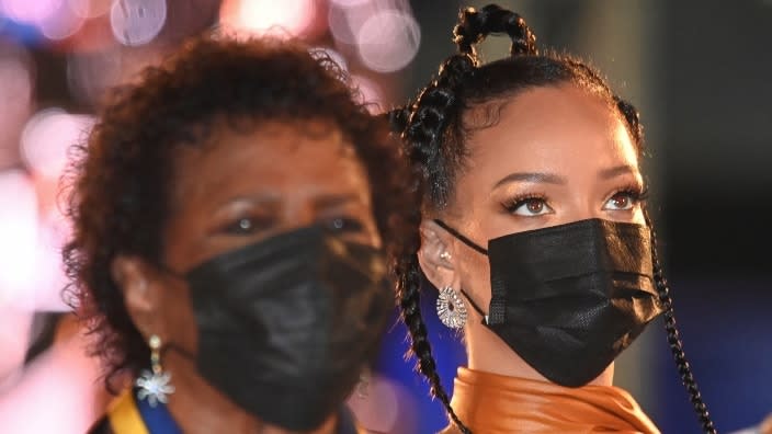 President of Barbados Dame Sandra Mason (left) and singer-entrepreneur Rihanna (right), who was honored as a National Hero, are shown at Heroes Square early Tuesday morning in Bridgetown, Barbados. (Photo: Toby Melville: Pool/Getty Images)