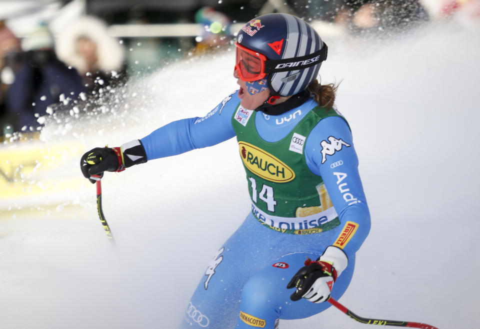 Italy's Sofia Goggia reacts in the finish area following her run in the women's World Cup Super-G ski race at Lake Louise, Alberta, on Sunday, Dec. 5, 2021. (Frank Gunn/The Canadian Press via AP)