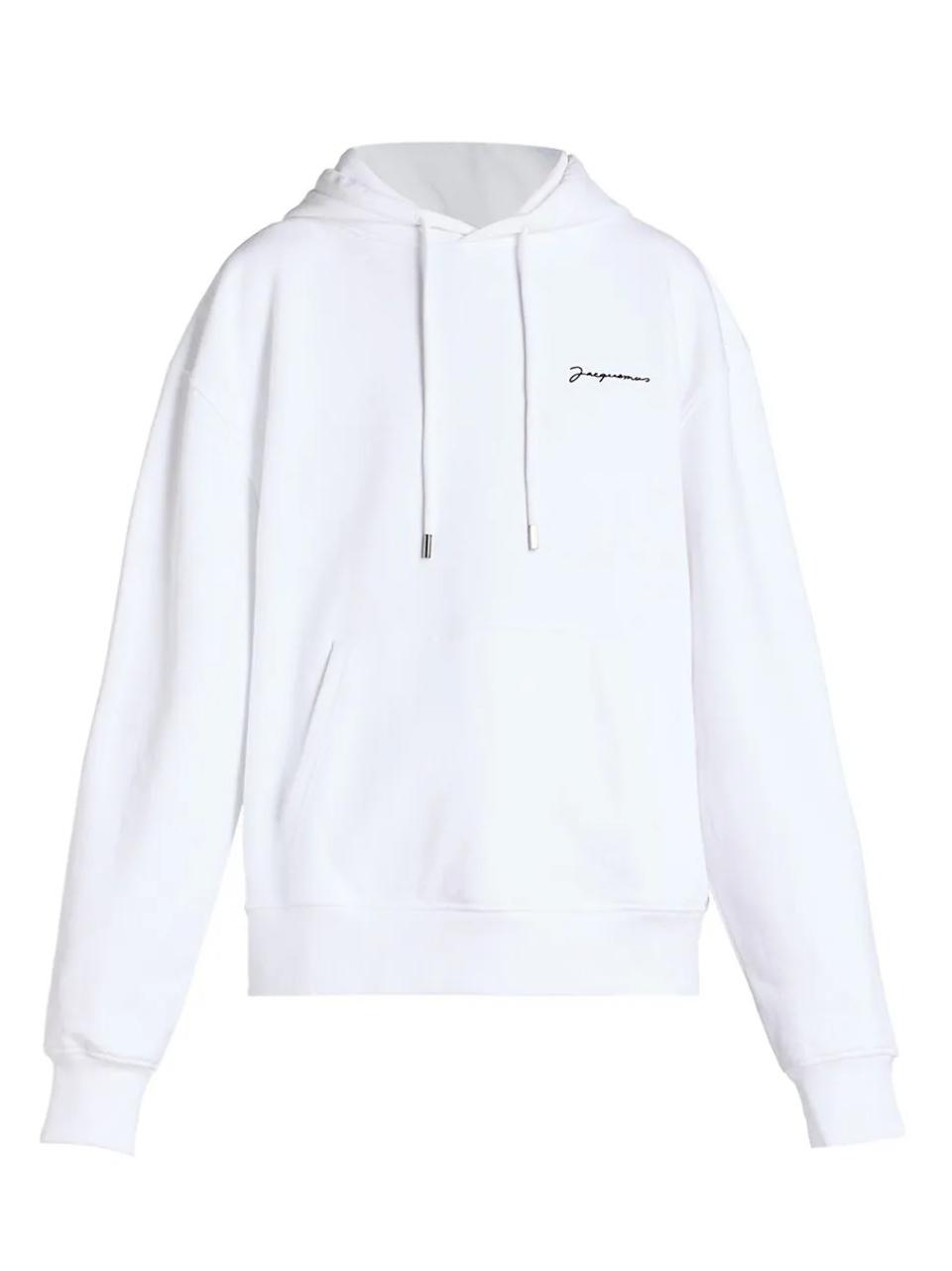 White hoodie with brand name in top right corner