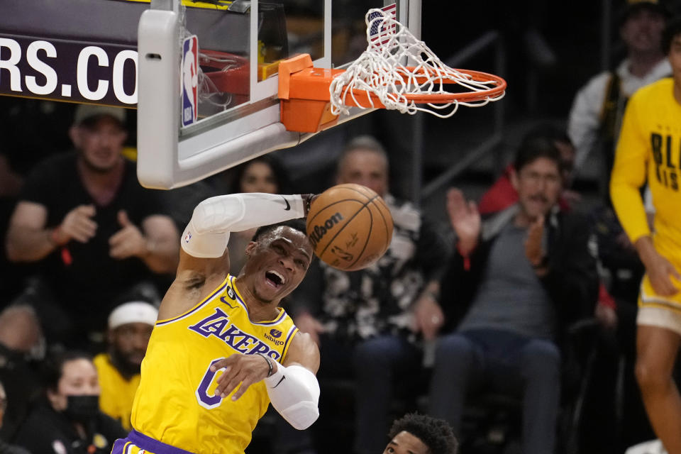 Los Angeles Lakers guard Russell Westbrook dunks during the first half of an NBA basketball game against the Oklahoma City Thunder Tuesday, Feb. 7, 2023, in Los Angeles. (AP Photo/Marcio Jose Sanchez)