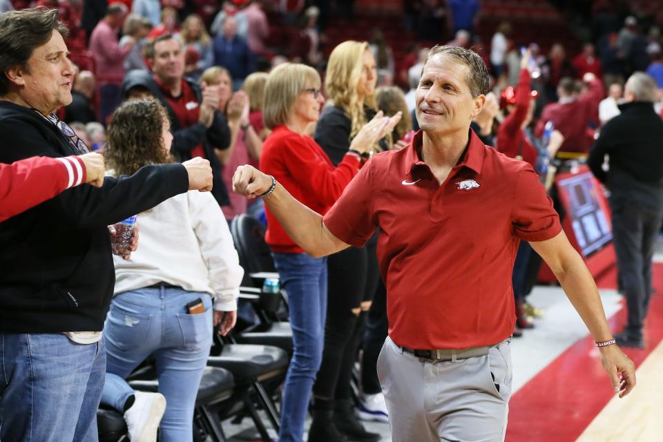 Nov 17, 2021; Fayetteville, Arkansas, USA; Arkansas Razorbacks head coach Eric Musselman celebrates with fans after the game against the UNI Panthers at Bud Walton Arena. Arkansas won 93-80. Mandatory Credit: Nelson Chenault-USA TODAY Sports