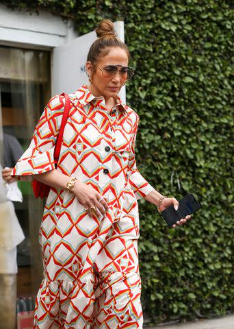 Jennifer Lopez's Halter Maxi Dress Just Raised the Bar for Summer Barbecue  Attire