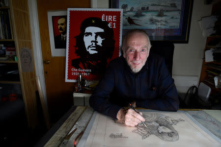 Artist Jim Fitzpatrick who has created an Irish postage stamp using the poster of Che Guevara he created in 1968 entitled 'Viva Che!' based on a photograph by Alberto Korda poses for a picture at his studio in Dublin, Ireland October 11, 2017. REUTERS/Clodagh Kilcoyne