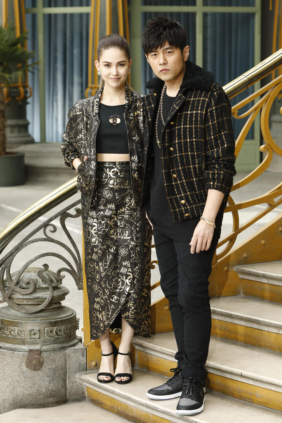 Hannah Quinlivan and Jay Chou attend the Chanel Cruise 2020 collection. - Credit: Getty Images for Chanel