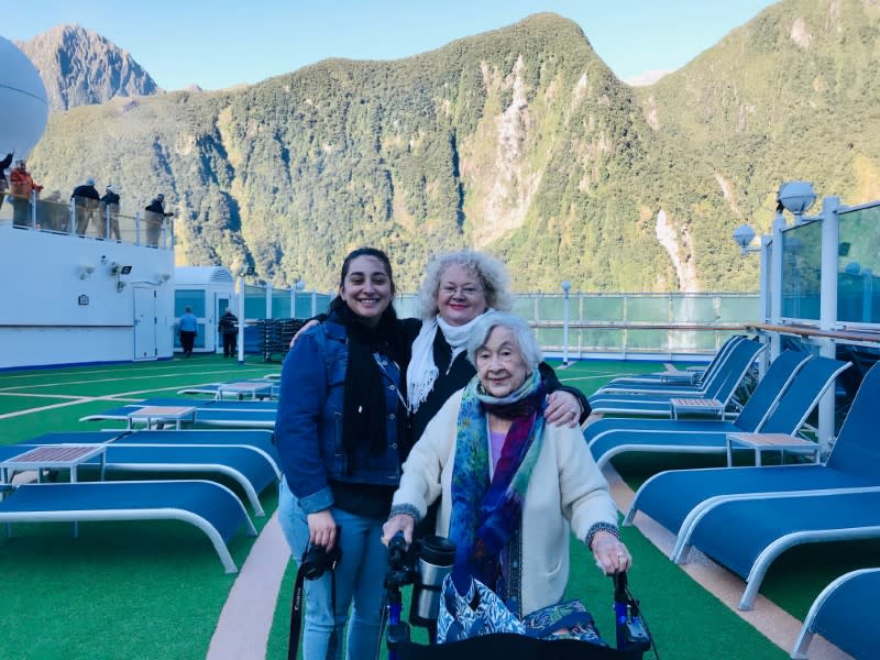 Sydney businesswoman Janet Dixon-Hughes, daughter Polly and her 95-year-old mother Wynne King pose for a photo on the cruise ship Ruby Princess in Fiordland National Park