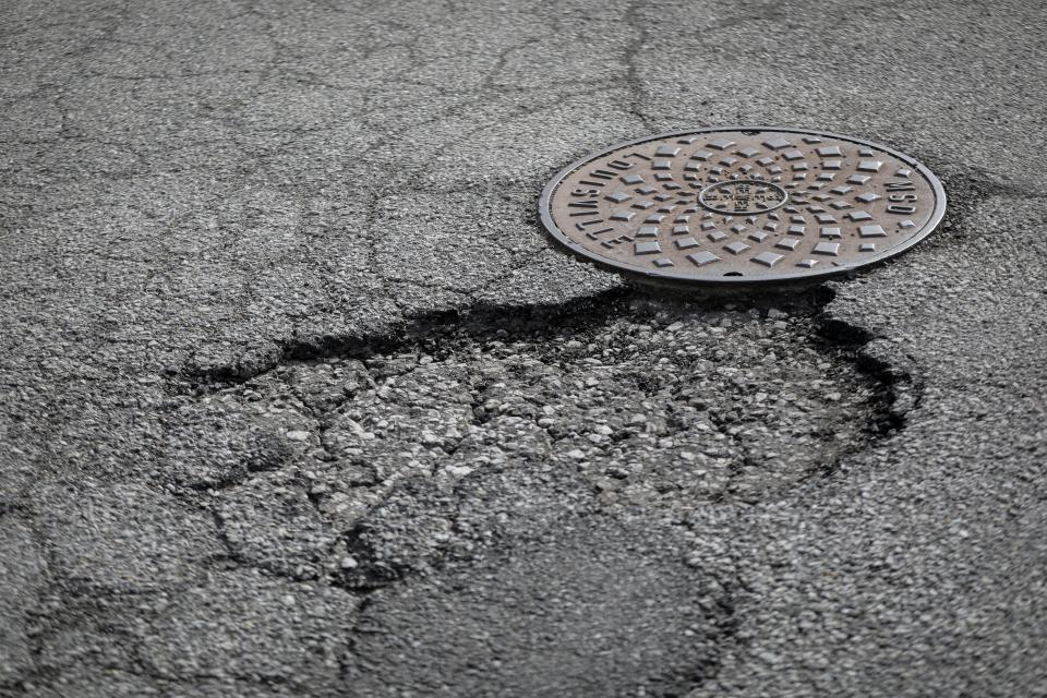 Potholes appear more frequently during the winter due to the freeze-thaw cycle that takes place. Water seeps beneath roads asphalt, freezes and expands, weakening the road. As traffic passes over these spots, it damages them, helping to form holes.