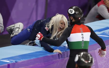 Short Track Speed Skating Events - Pyeongchang 2018 Winter Olympics - Men's 5000m Relay Final - Gangneung Ice Arena - Gangneung, South Korea - February 22, 2018 - Shaolin Sandor Liu of Hungary celebrates with Elise Christie of Britain. REUTERS/John Sibley