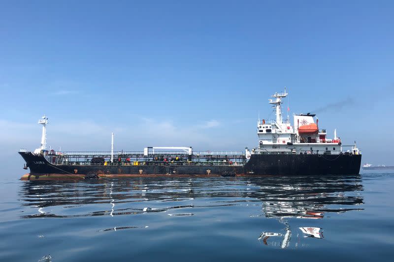 FILE PHOTO: An oil tanker is seen in the sea outside the Puerto La Cruz oil refinery in Puerto La Cruz