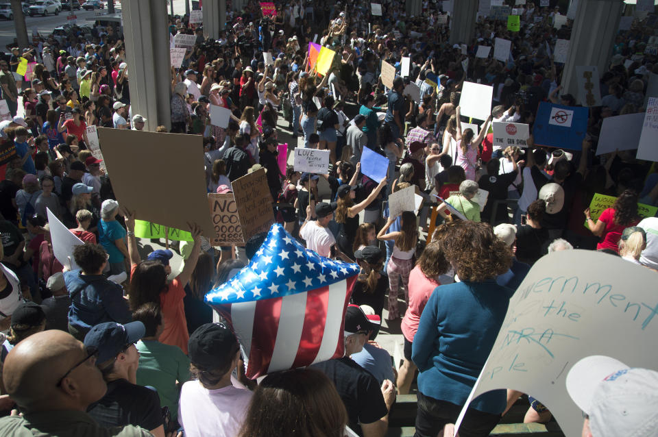 People gathered at the Fort Lauderdale federal courthouse on Feb. 17, 2018, to call for gun control in the wake of the deadly high school shooting in Parkland, Florida.