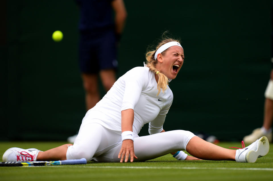 Belarus' Victoria Azarenka slips during her match against Portugal's Maria Joao Koehler during day one of the Wimbledon Championships at The All England Lawn Tennis and Croquet Club, Wimbledon.