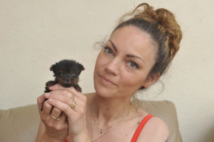 Tim with his owner, Andrea McGowan (Picture: SWNS)