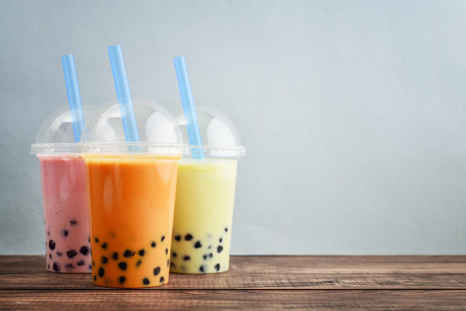 Various Bubble Tea in a plastic cups with drink straws. (PHOTO: Getty Images)