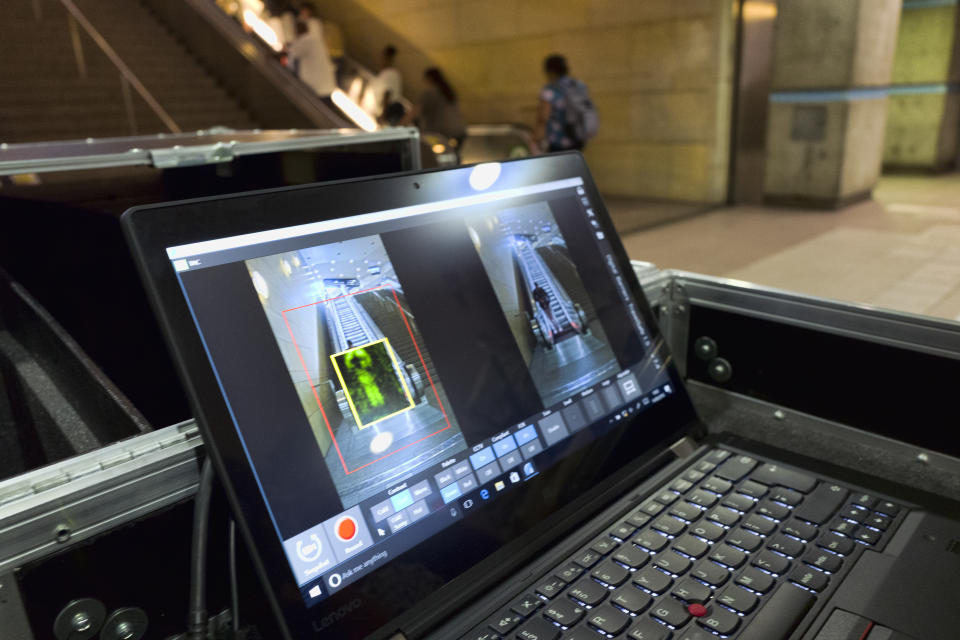 ThruVision suicide vest-detection technology that reveals suspicious objects on people is seen during a Transportation Security Administration demonstration at Union Station in Los Angeles on Tuesday, Aug. 14, 2018. Los Angeles is poised to have the first mass transit system in the U.S. with body scanners that screen passengers for weapons and explosives. (AP Photo/Richard Vogel)